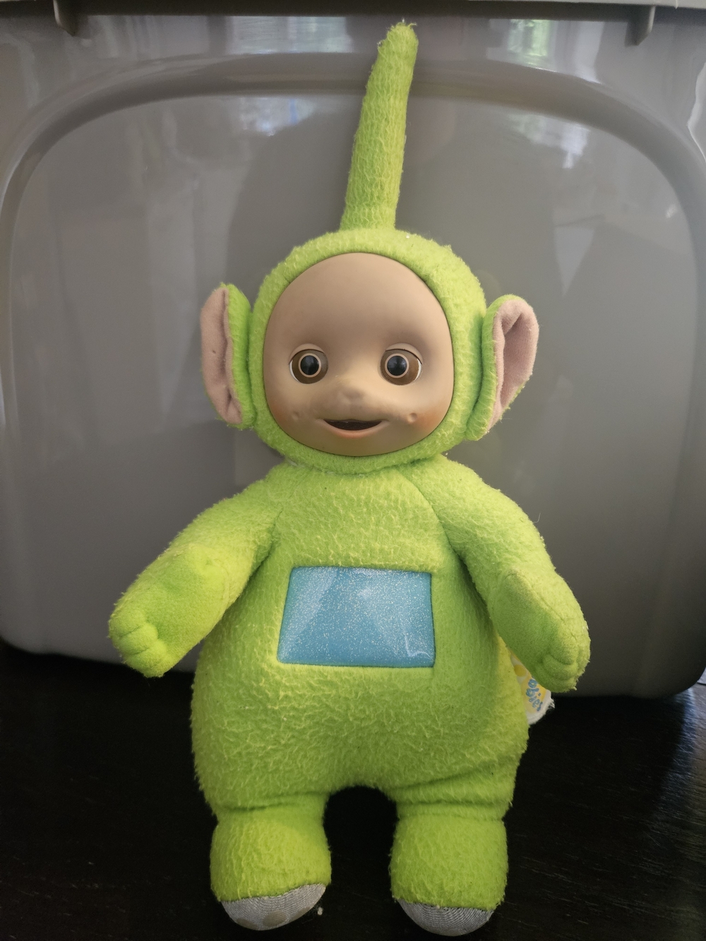 Bright Green Plush Character Toy with Blue Belly Panel